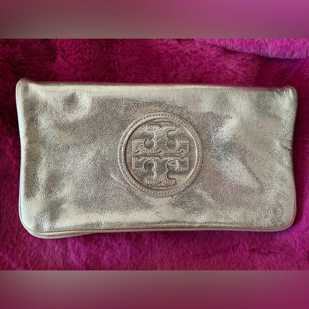 Tory Burch gold clutch